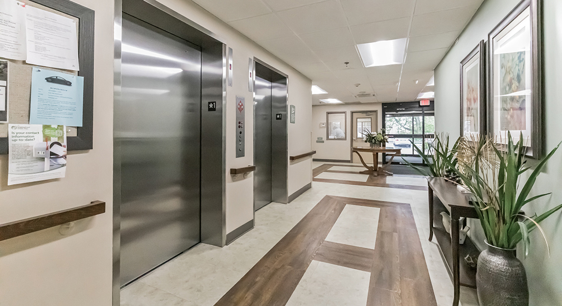 Foyer and elevators at East Side Apartments