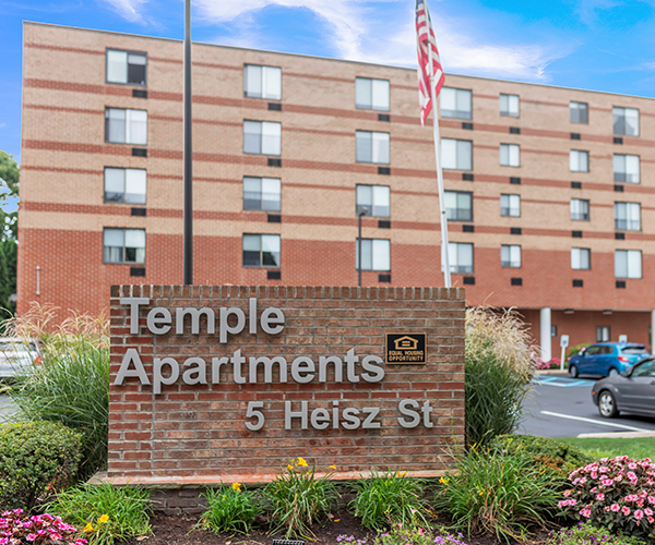 Temple Apartments sign and building